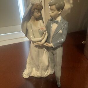 Lladro Porcelain Bride and Groom Figurine in White, Light Blue and Pink